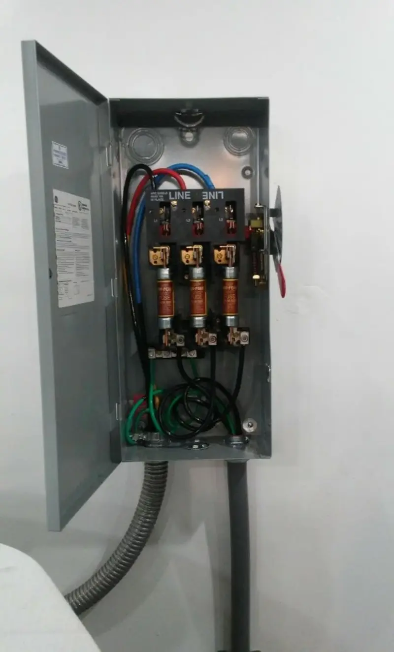 Three-phase disconnect switch installed for Smoke Detector Installation in Sennett